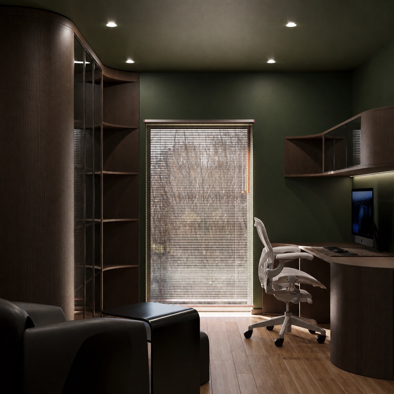 A study with dark green walls, a built-in desk and monitor, open shelving, and a rain-streaked window.