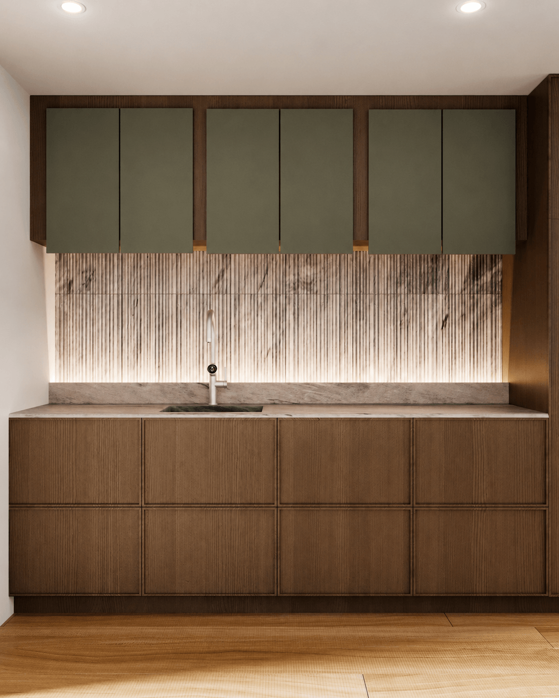 A frontal kitchen sink elevation with olive upper cabinets, ribbed timber drawers and a vertically fluted stone splashback.