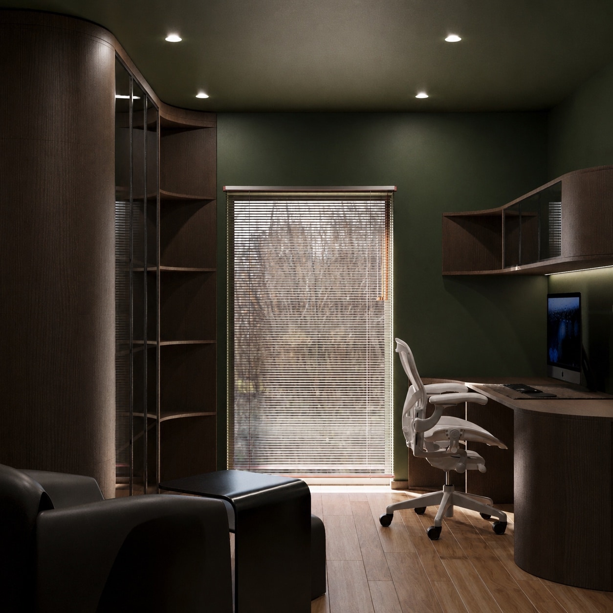 A study with dark green walls, a built-in desk and monitor, open shelving, and a rain-streaked window.