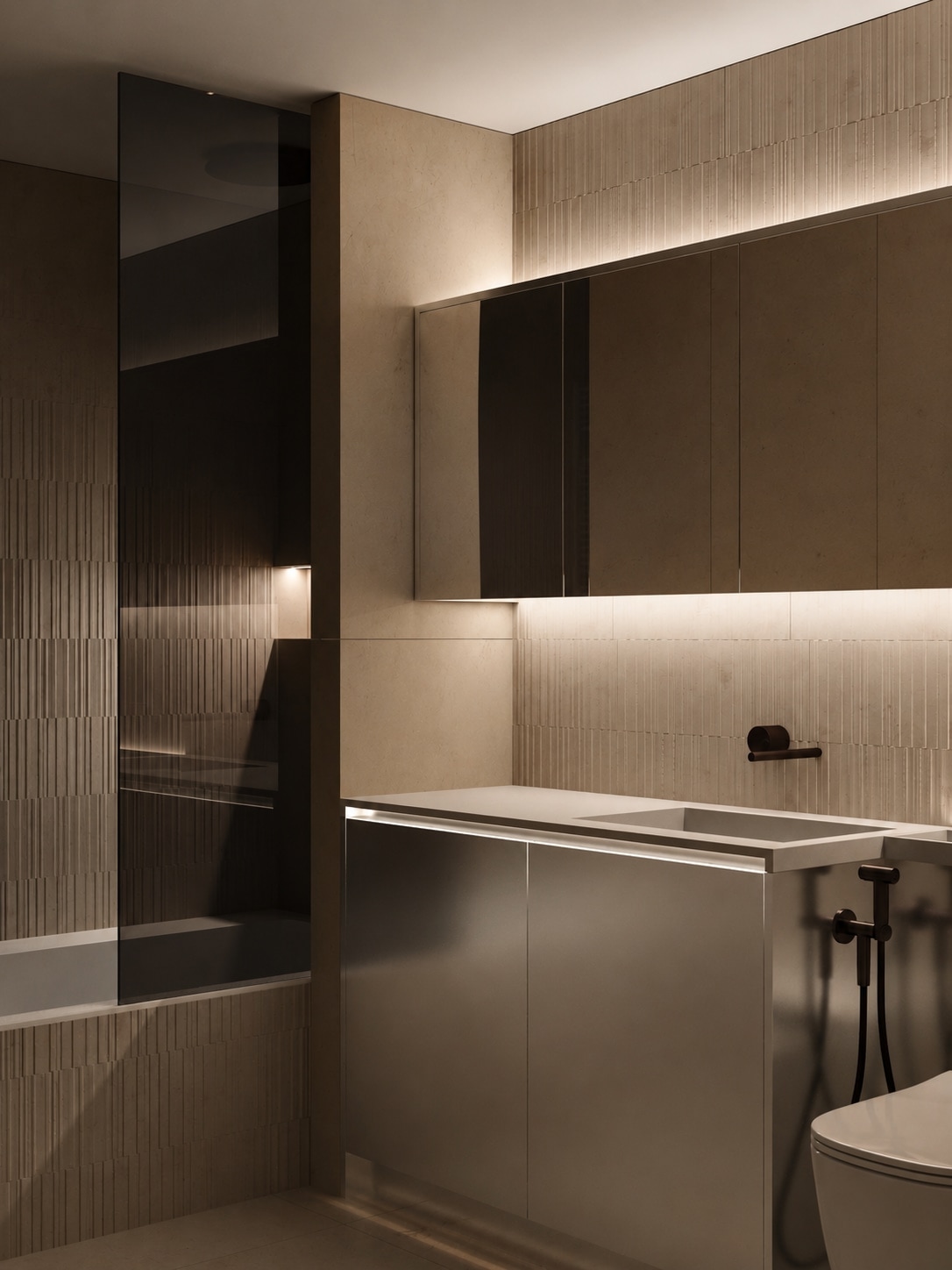 A bathroom viewed across a glazed shower screen towards a floating vanity and mirrored cabinet.